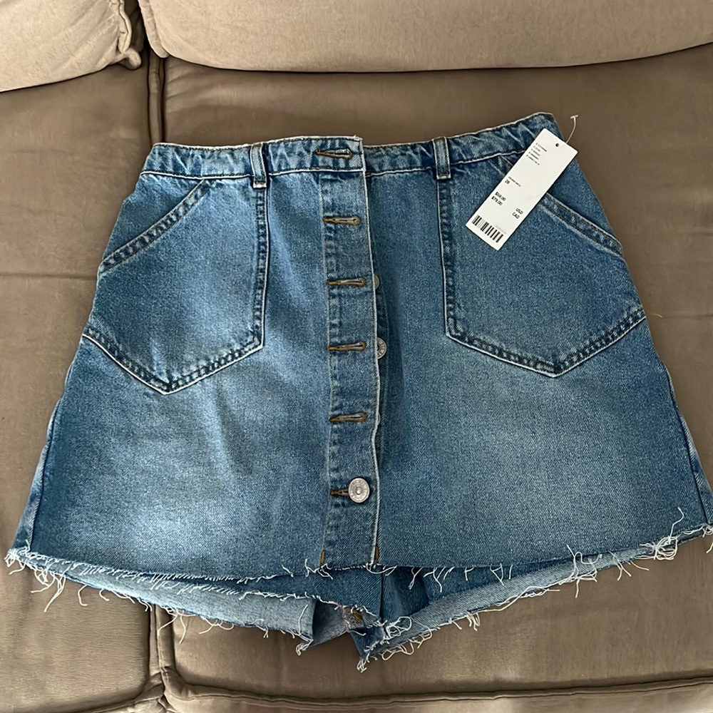 Urban Outfitters denim skort button from broken zip in the back NWT.